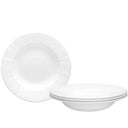 Set of white ceramic bowls on a light gray background