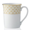 White mug with gold geometric pattern on a white background