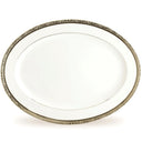 Clear glass plate with decorative silver rim on a white background