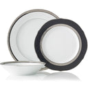 Set of dinnerware with black and silver rim design on a white background