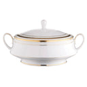 White ceramic tureen with gold trim on a white background