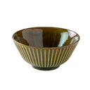 Ceramic bowl with striped design on a white background